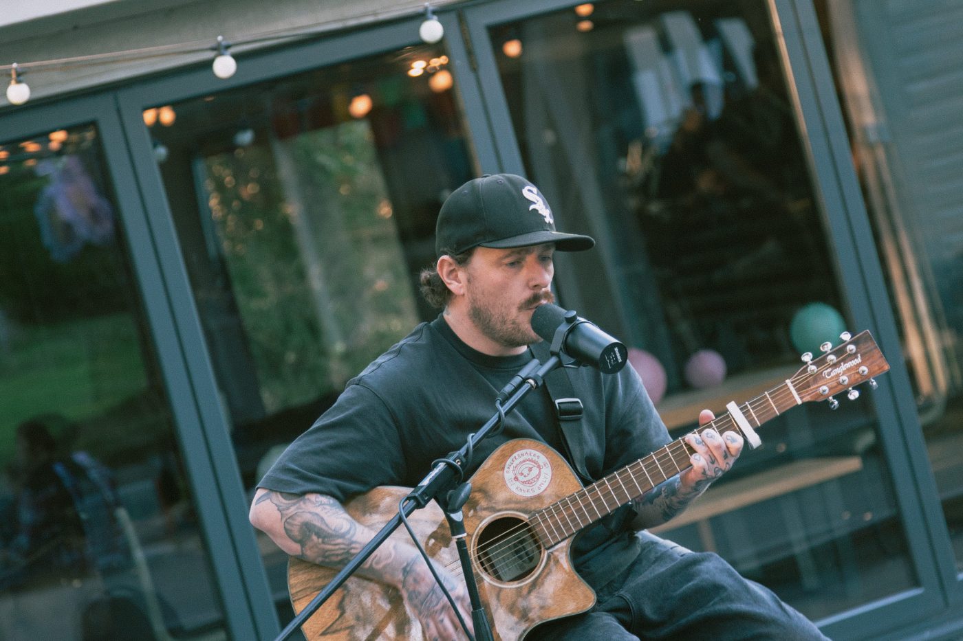 Live acoustic set by the bar