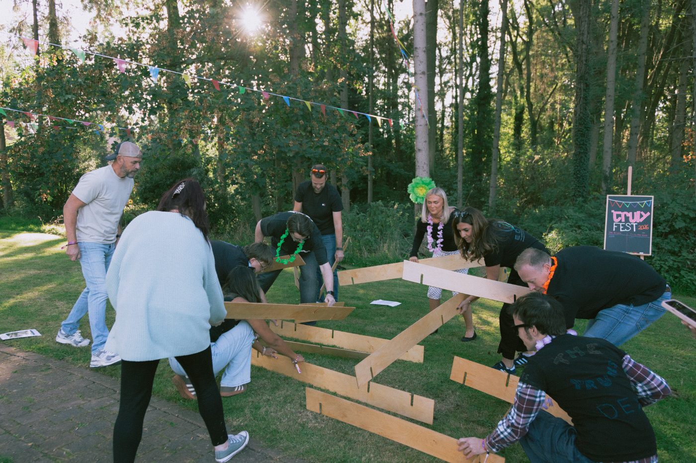 Teams assembling the plank puzzle
