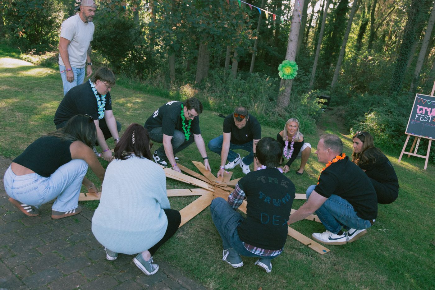 Team fitting the planks together