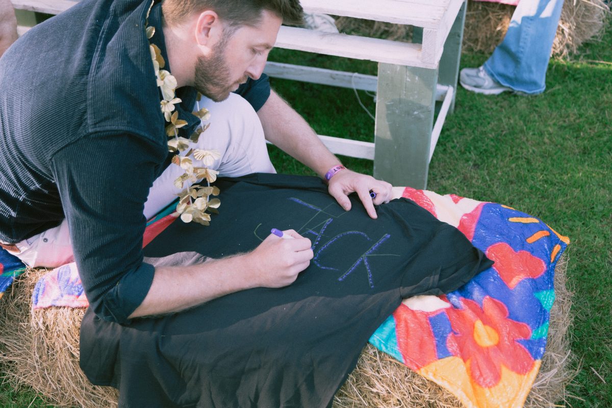 Drawing a team name on a t-shirt